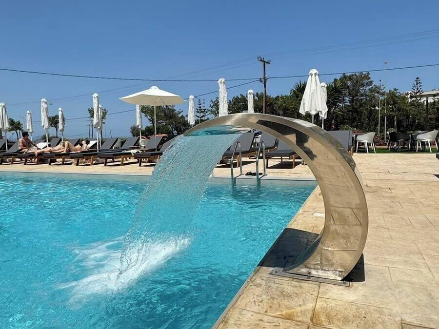 2 outdoor pools, pool umbrellas, sun loungers