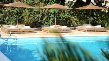 Seasonal outdoor pool, open 10:30 AM to 6 PM, sun loungers