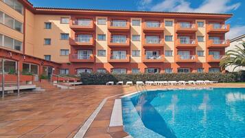 Apartment, 1 Bedroom, Pool View | Desk, laptop workspace, cots/infant beds, free WiFi