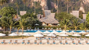 2 outdoor pools, open 7:00 AM to 7:00 PM, pool umbrellas, sun loungers