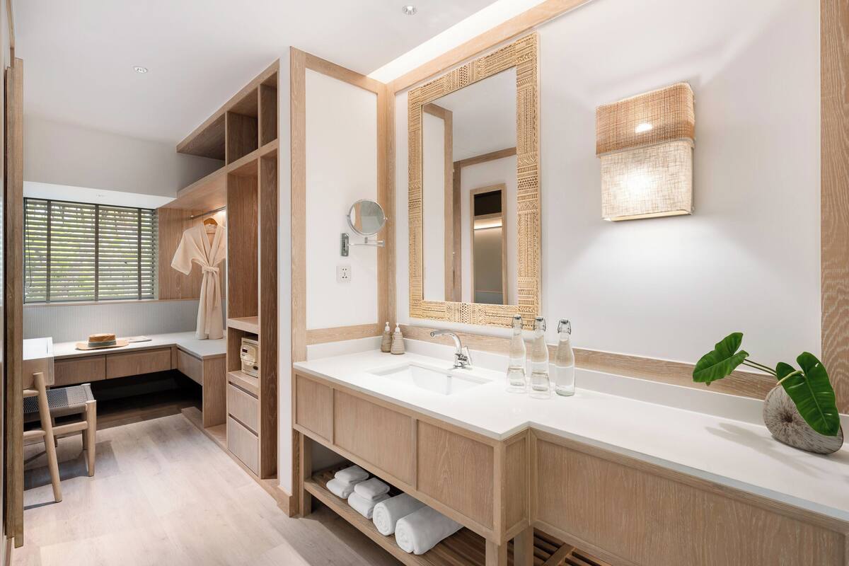 deluxe garden villa 1 king | bathroom | separate bathtub and shower, free toiletries, hair dryer, bathrobes