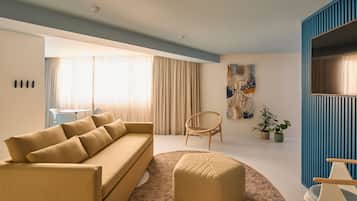 Suite, 1 King Bed with Sofa bed | 1 bedroom, in-room safe, individually decorated, desk