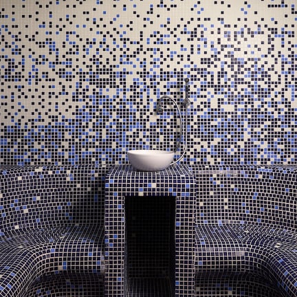 A bathroom with a mosaic tile design, a sink, and a shower area.