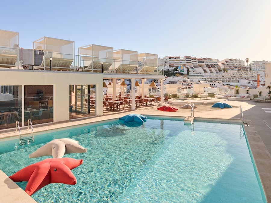 Indoor pool, outdoor pool, pool umbrellas, pool loungers