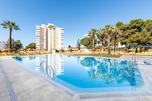 Outdoor pool, pool umbrellas, pool loungers