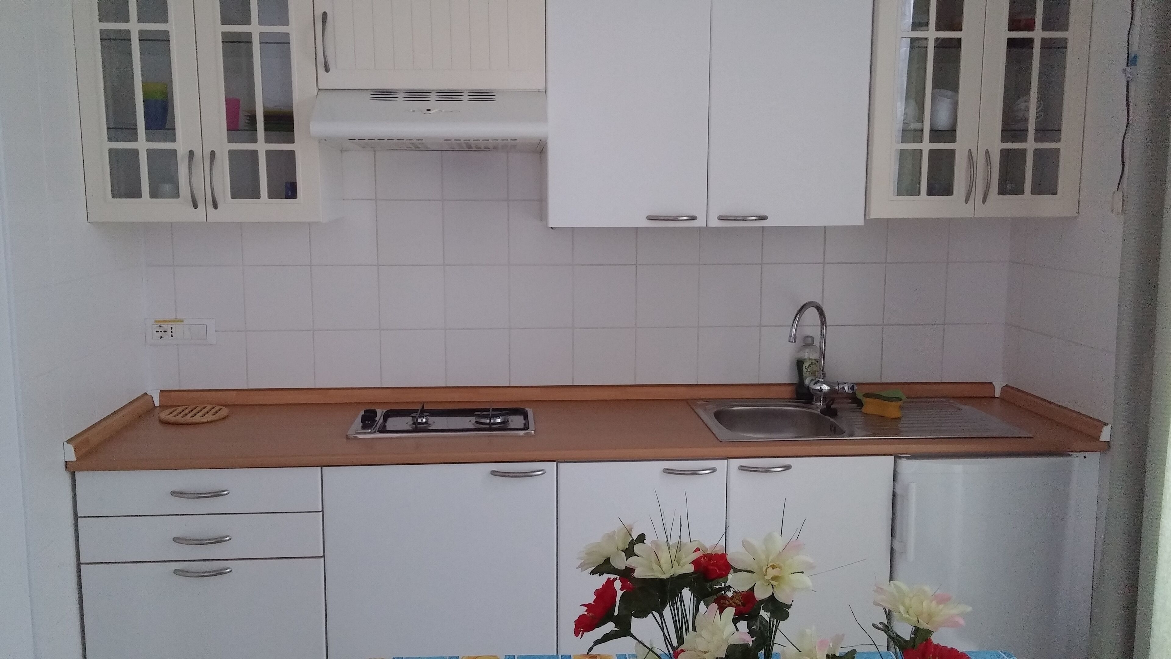 family room, kitchenette | 1 bedroom, premium bedding, minibar, in-room safe