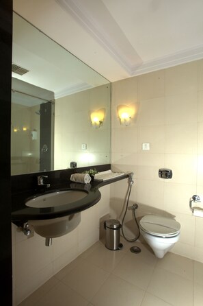 Mango Comfort | Bathroom | Shower, rainfall showerhead, free toiletries, hair dryer - Mango Hotels, Hyderabad (Hyderabad)