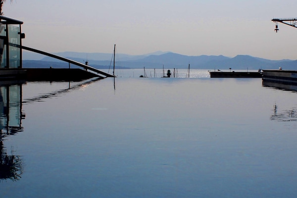 Outdoor pool, open 10:00 AM to 9:00 PM, sun loungers
