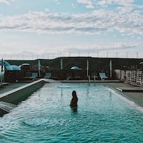 Outdoor pool, pool umbrellas, sun loungers