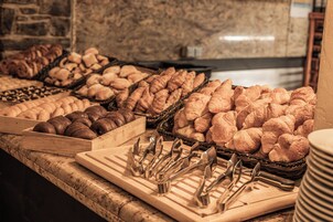 Daily buffet breakfast (EUR 14 per person)