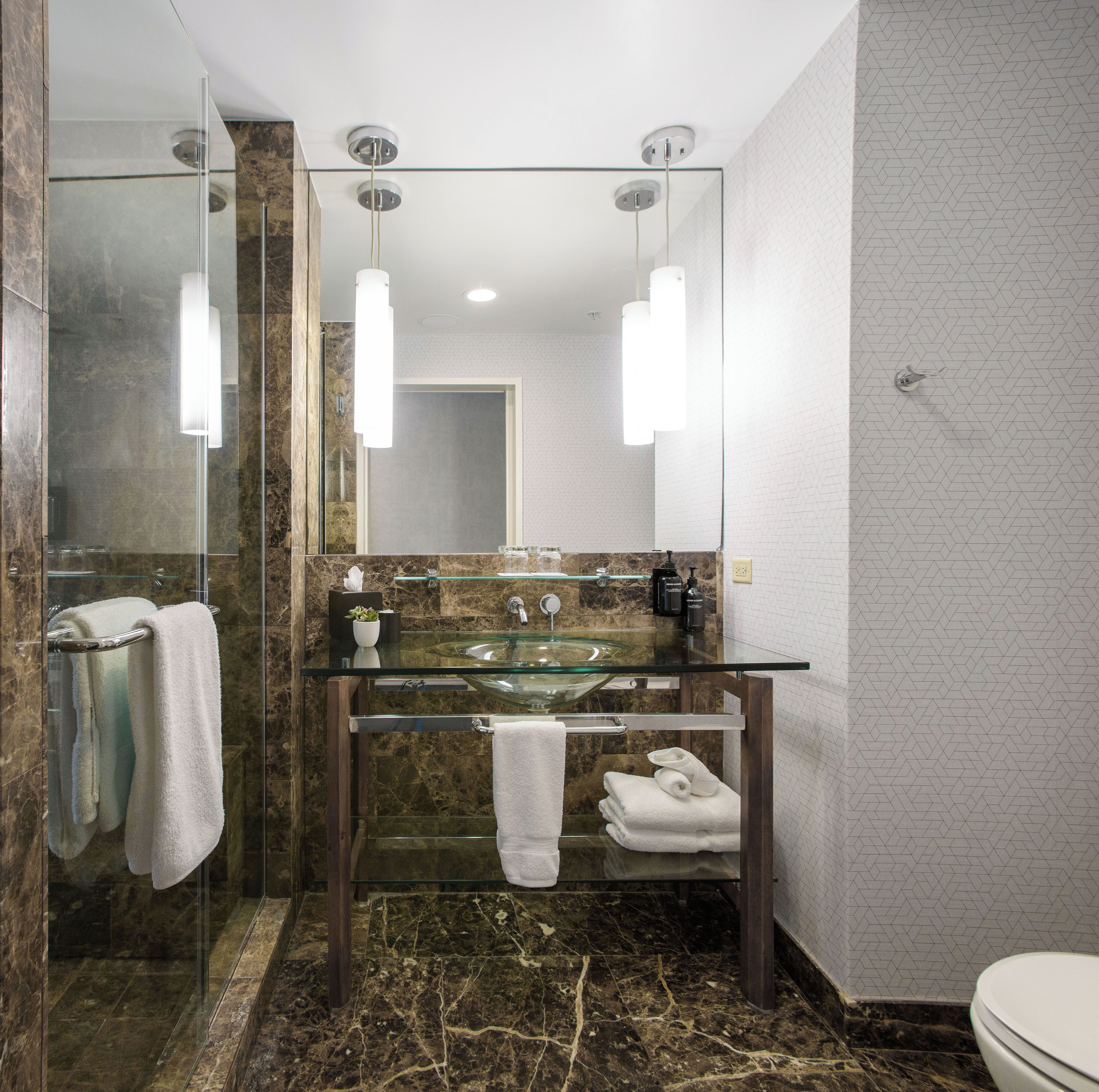 shower, rainfall showerhead, designer toiletries, hair dryer