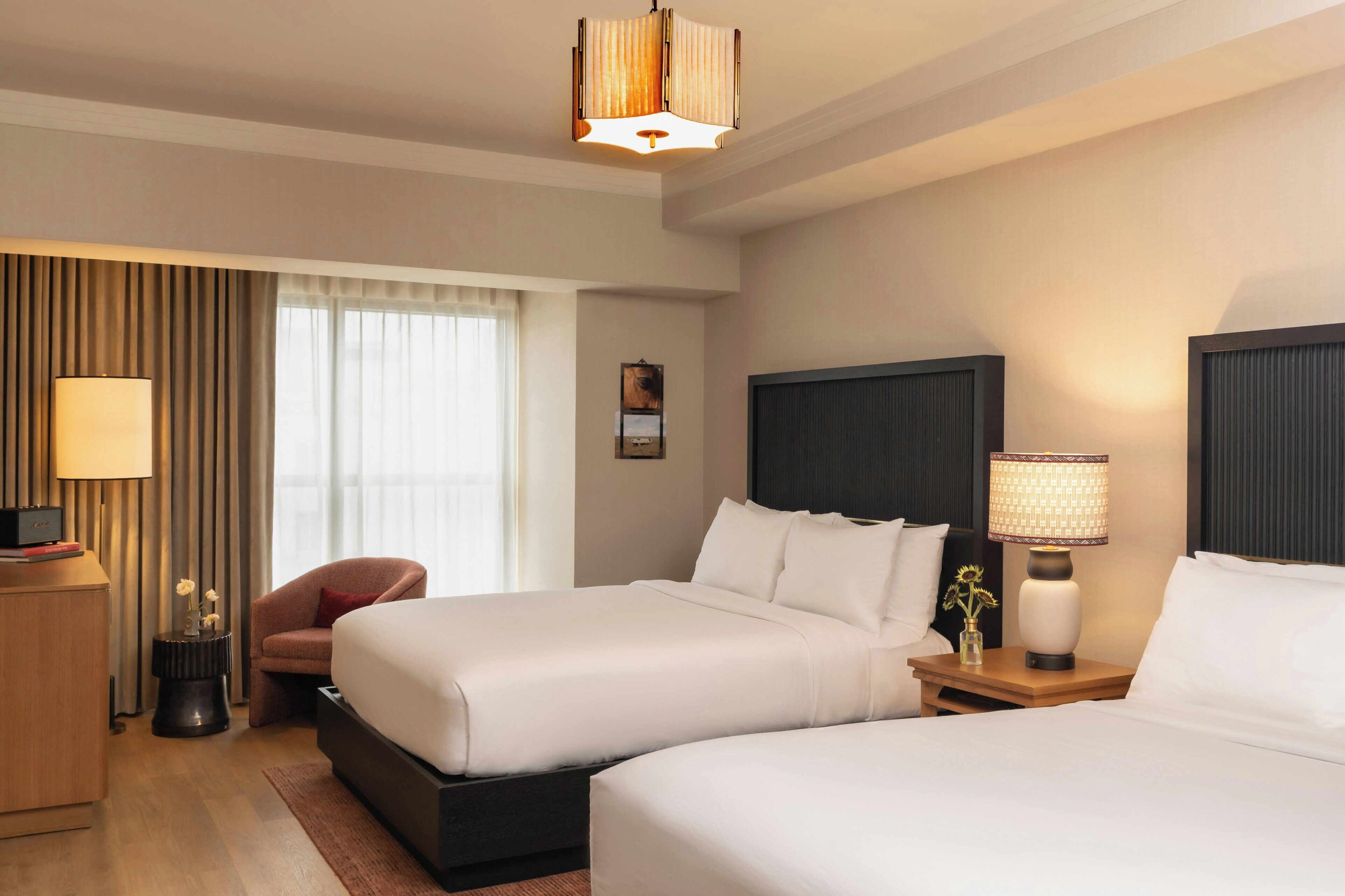 Premium bedding, down comforters, minibar, in-room safe