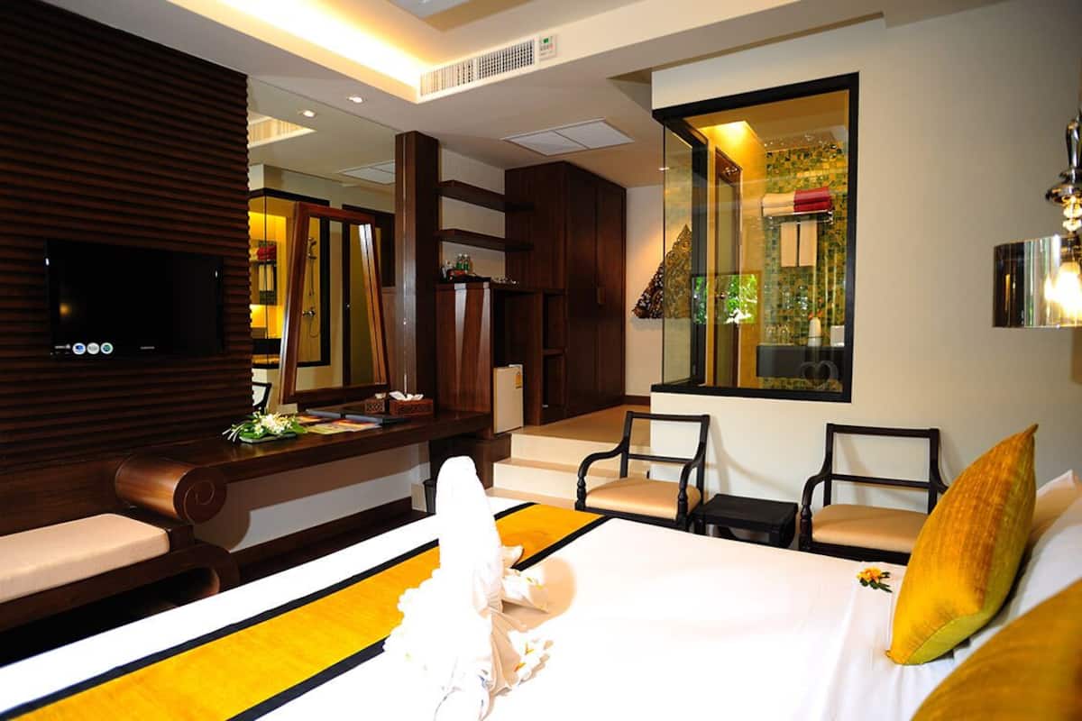 Colchones con pillow-top, minibar y caja de seguridad en la habitación