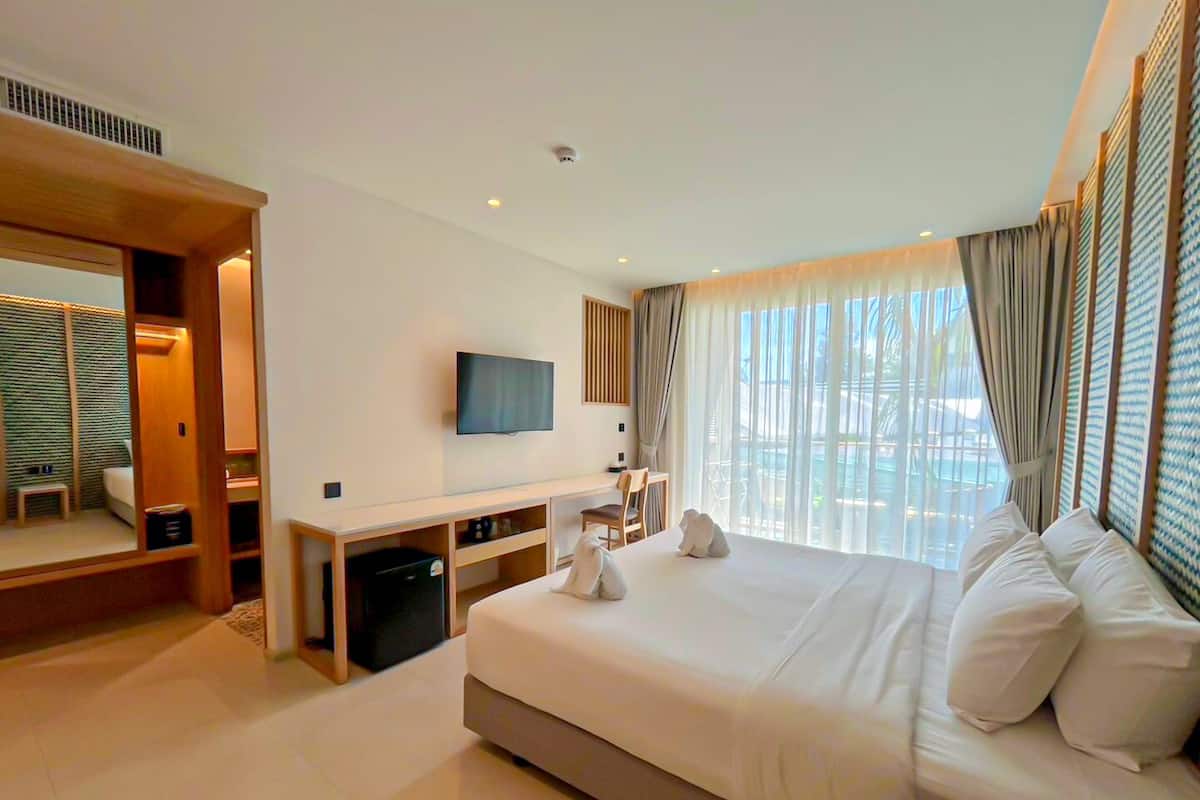 Colchones con pillow-top, minibar y caja de seguridad en la habitación