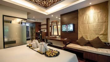 Colchones con pillow-top, minibar y caja de seguridad en la habitación