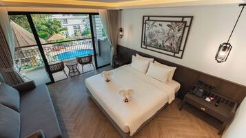 Colchones con pillow-top, minibar y caja de seguridad en la habitación