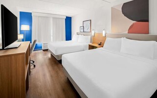 Premium bedding, pillowtop beds, desk, laptop workspace