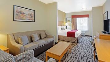 Premium bedding, desk, laptop workspace, iron/ironing board