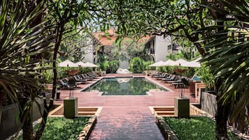 Outdoor pool, open 6:00 AM to 8:00 PM, pool umbrellas, pool loungers