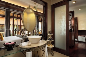 Designer toiletries, hair dryer, bathrobes, slippers