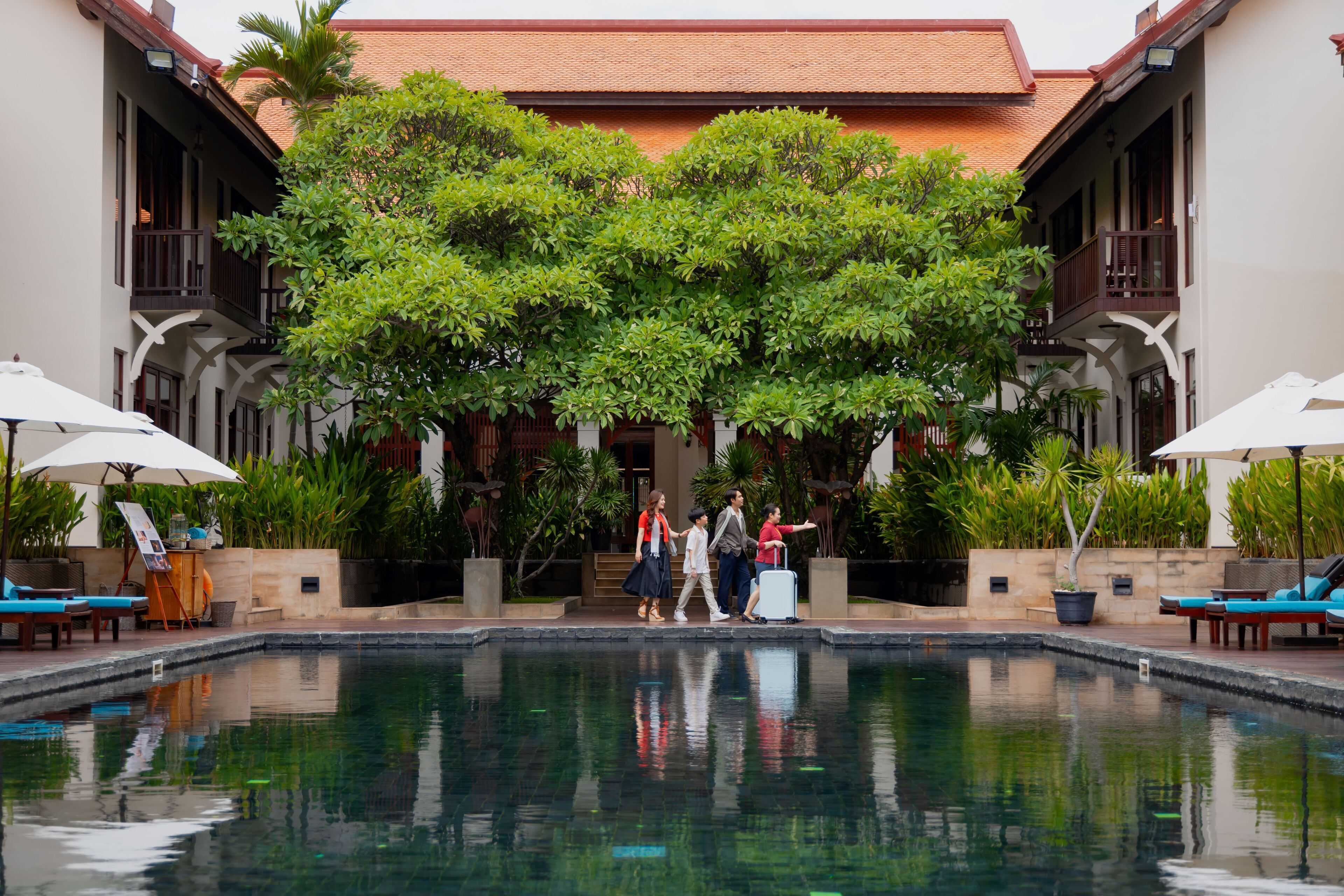 outdoor pool, open 6:00 am to 8:00 pm, pool umbrellas, pool loungers