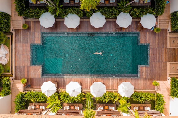 Outdoor pool, open 6:00 AM to 8:00 PM, pool umbrellas, sun loungers