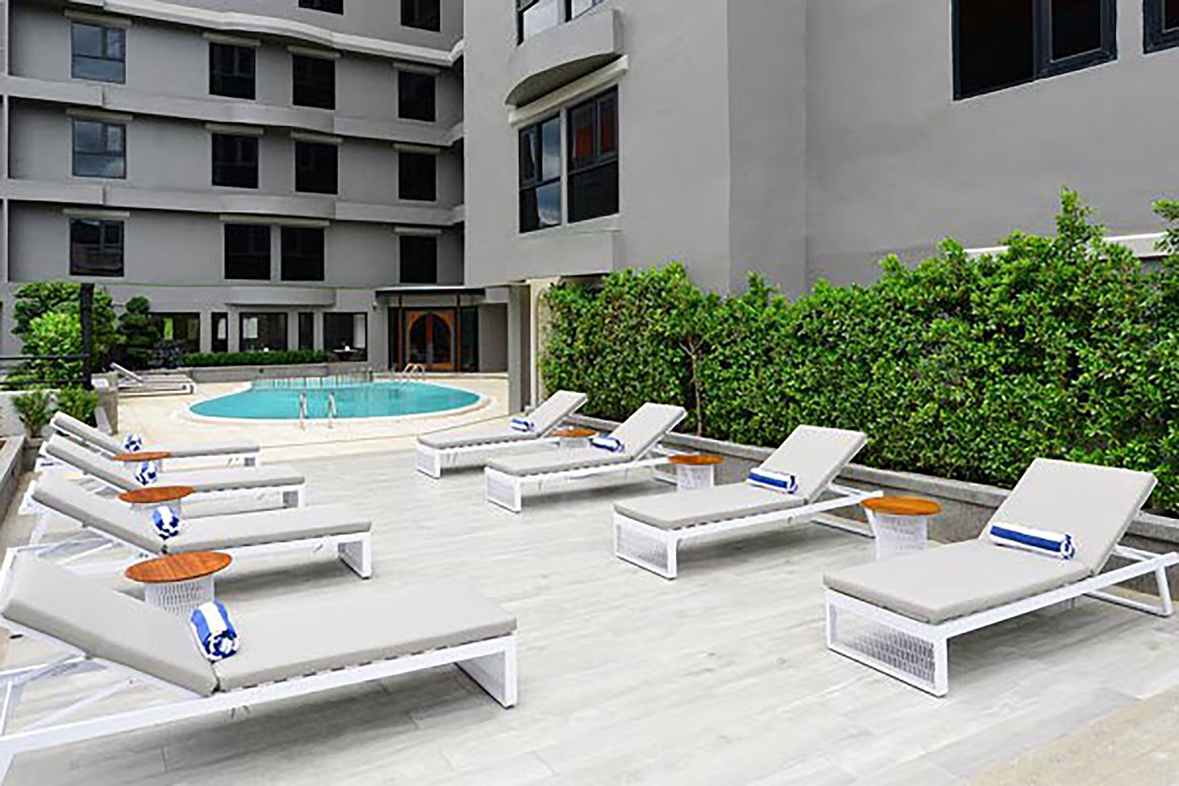outdoor pool, pool loungers