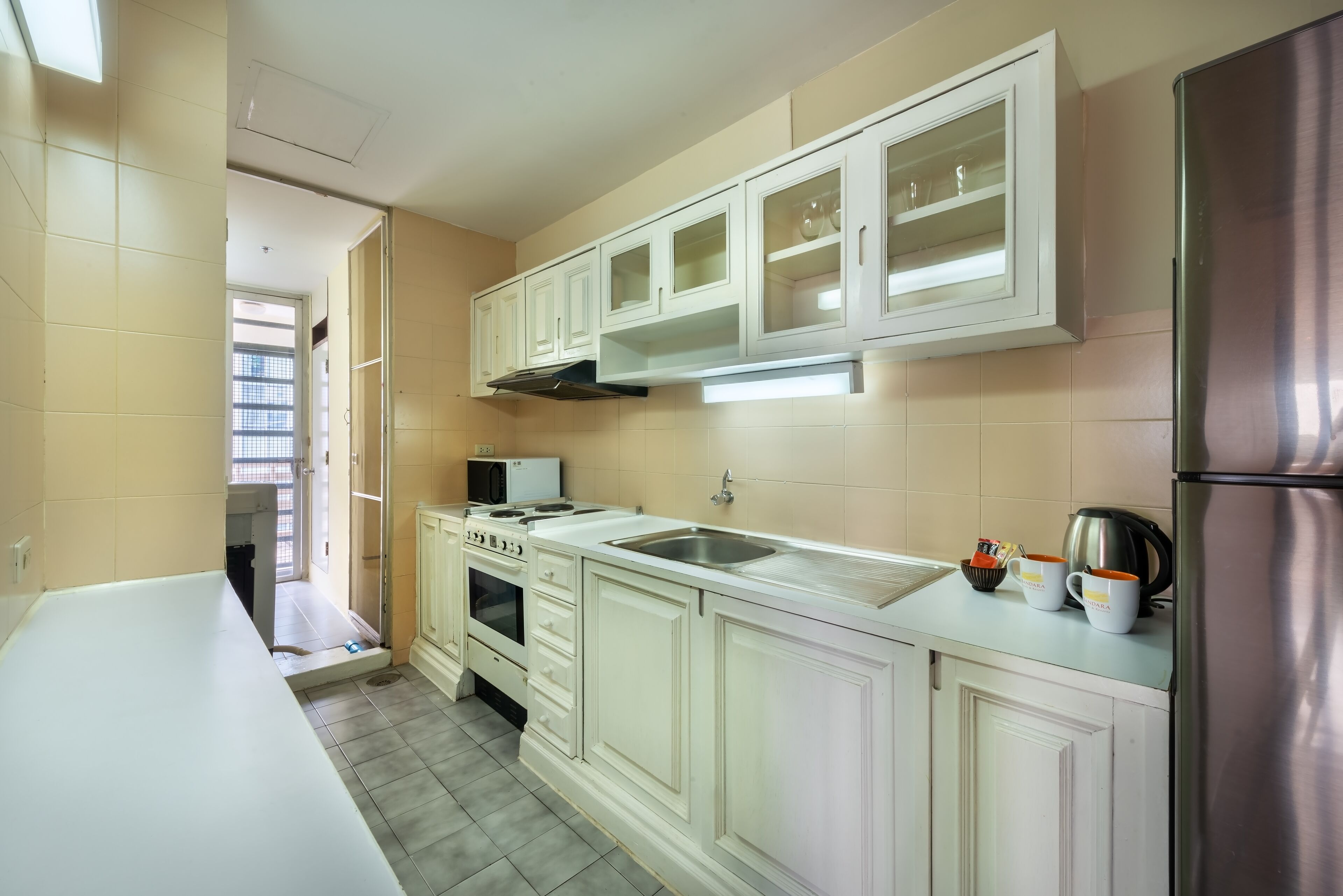 one bedroom residence with balcony | private kitchen | fridge, electric kettle