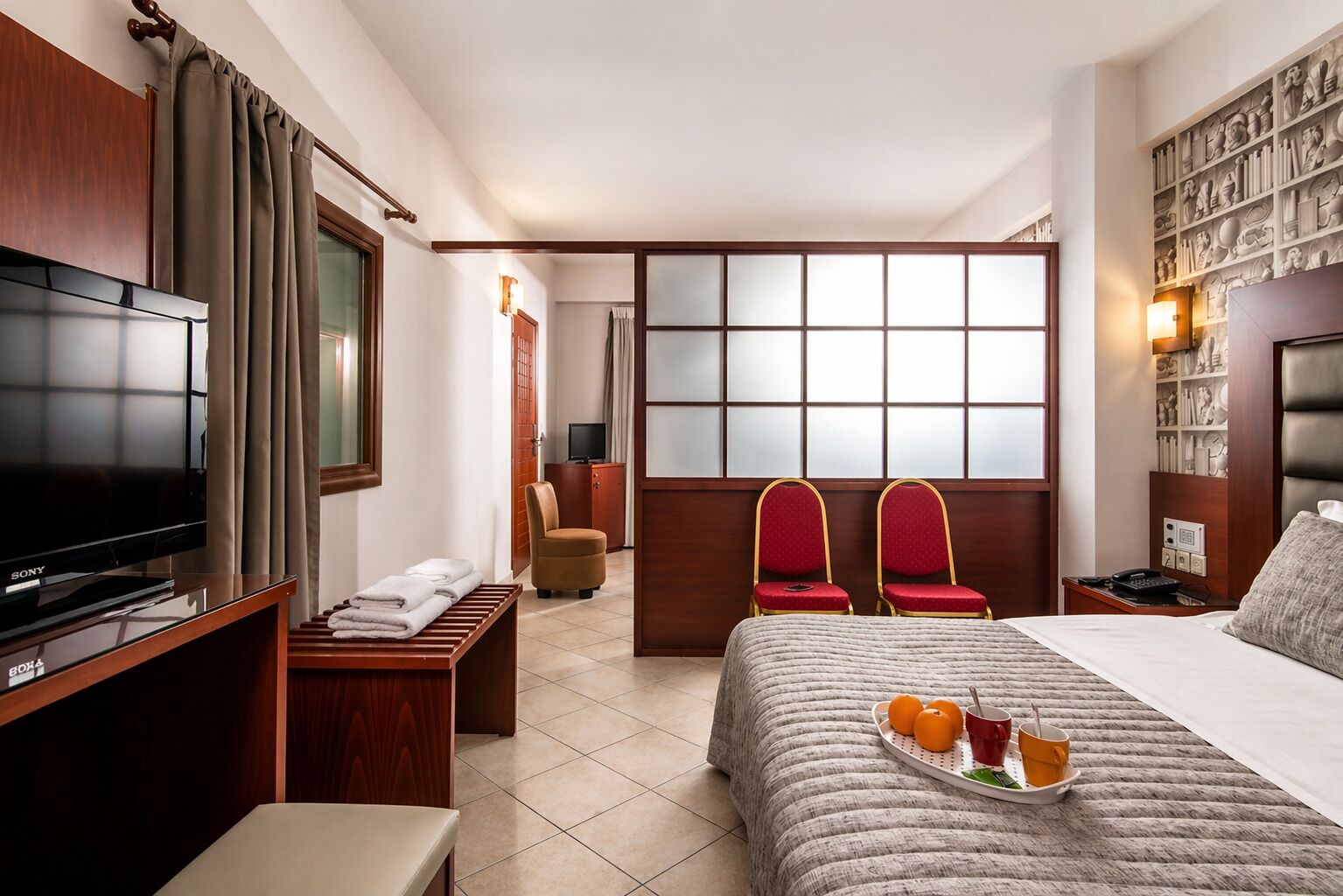 Suite familiar | Minibar, caja fuerte, escritorio y sistema de insonorización