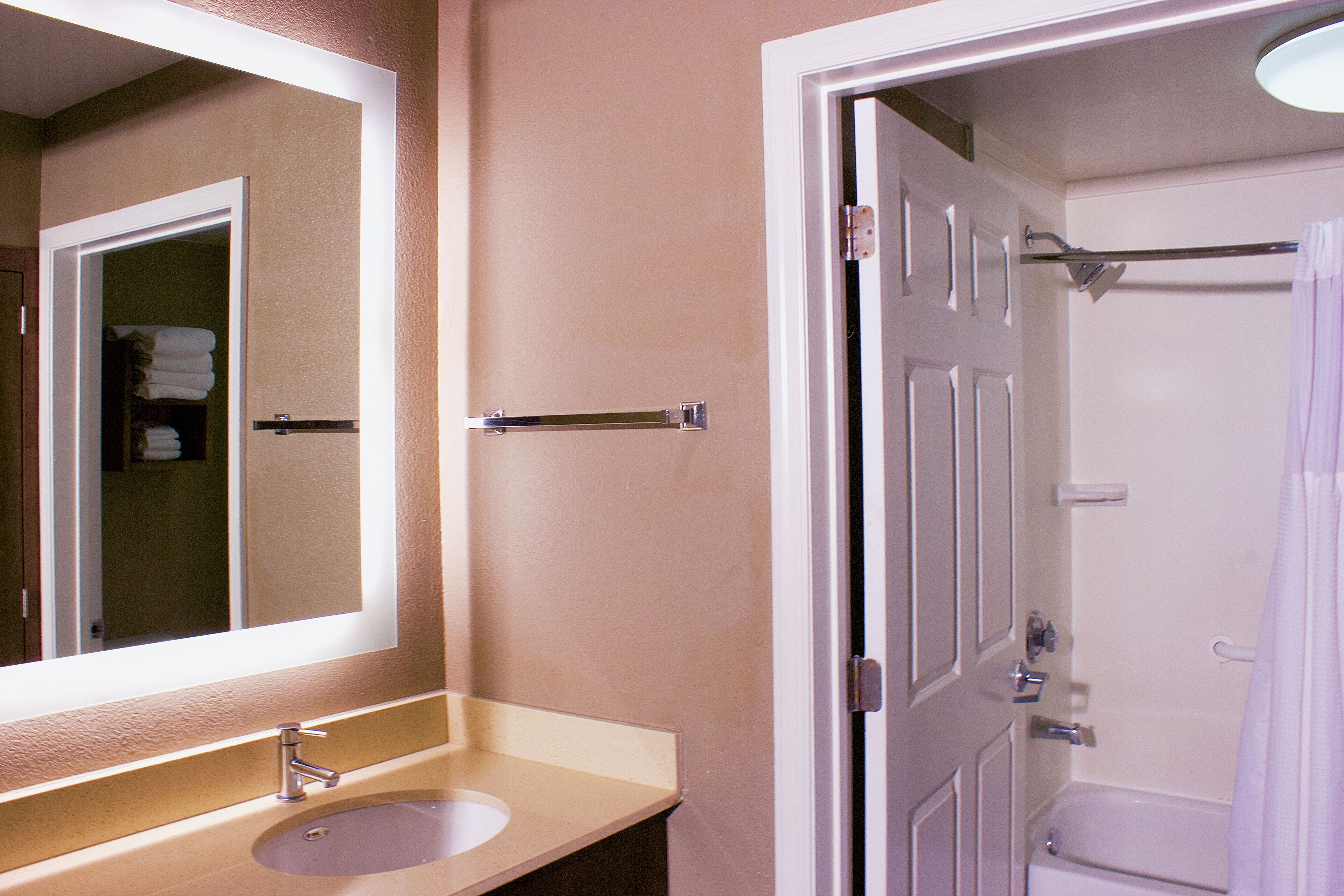 studio suite | bathroom | hair dryer, towels