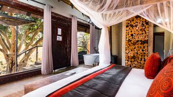 River Lodge Thatched Suites | Premium bedding, pillowtop beds, in-room safe, individually decorated