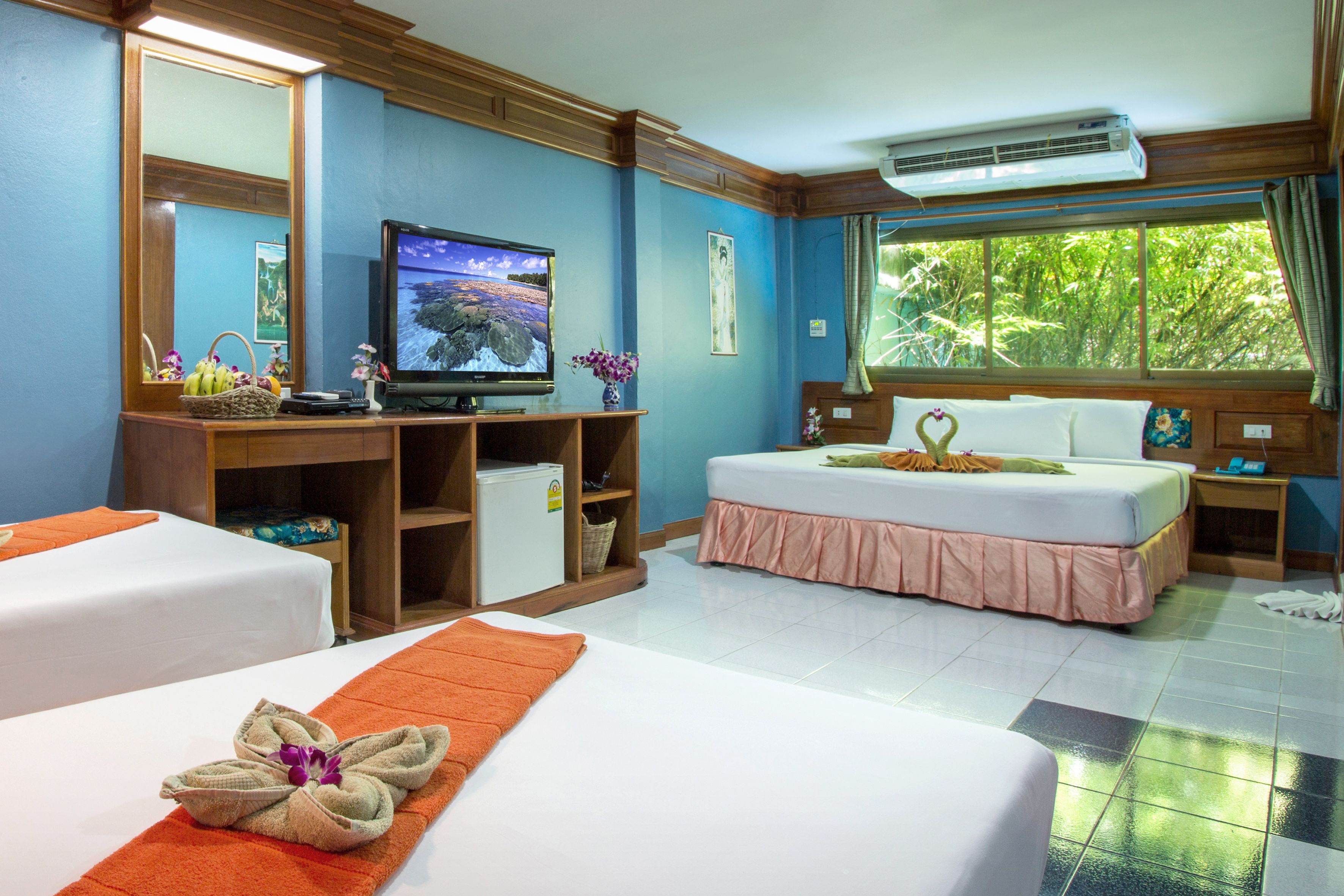 Family Room | Premium bedding, minibar, desk, blackout drapes