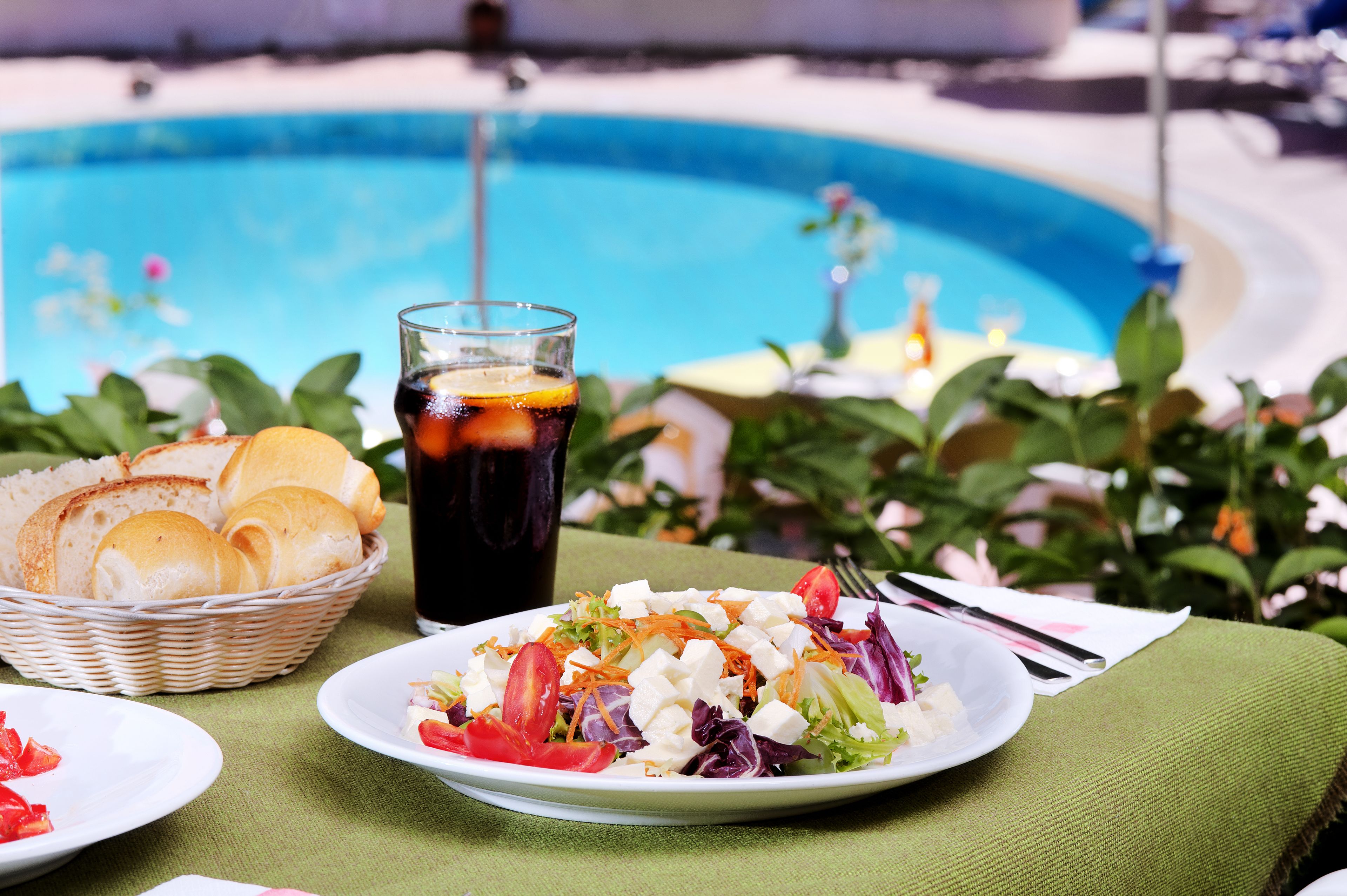 2 outdoor pools, pool umbrellas, pool loungers