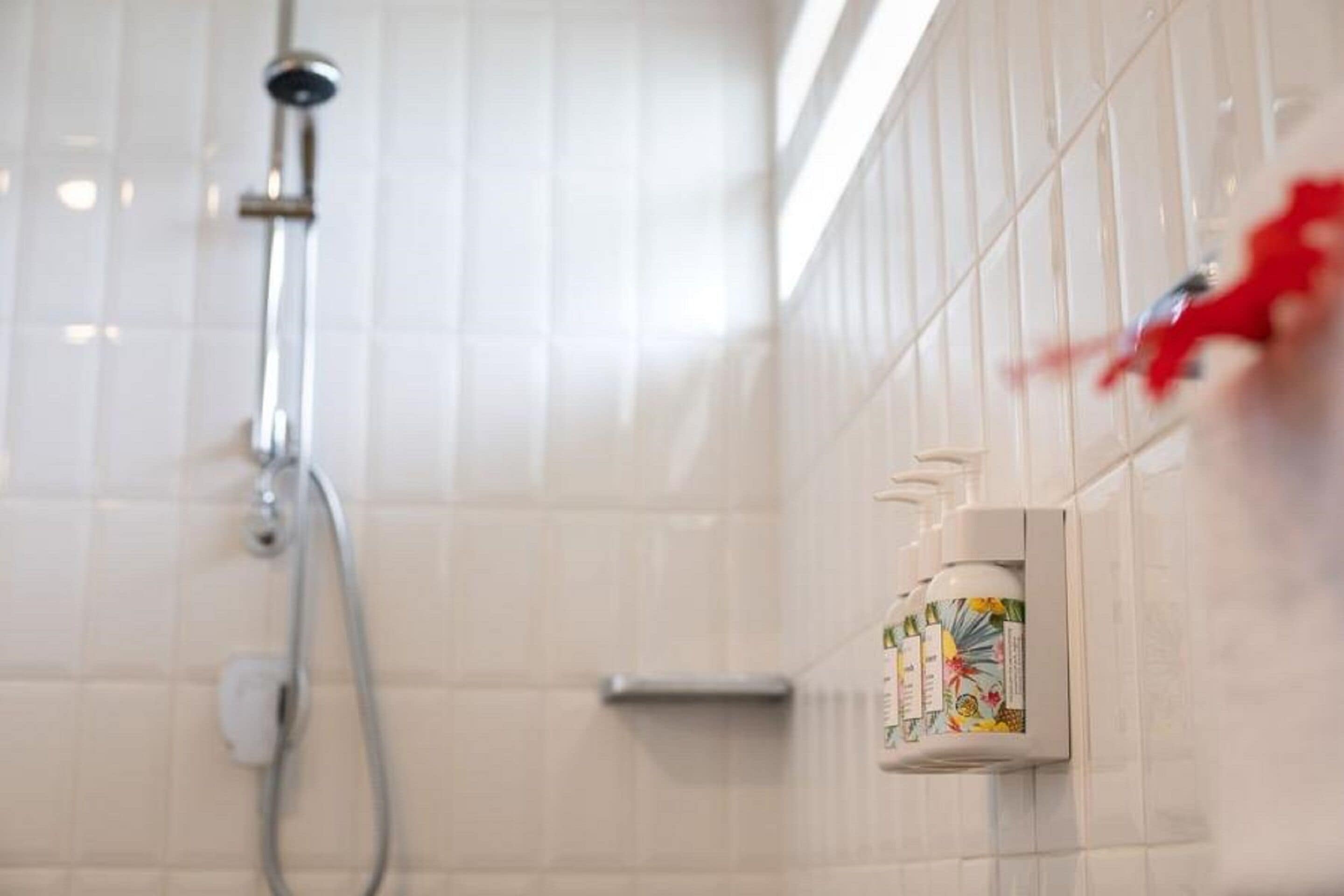 shower, eco-friendly toiletries, hair dryer, towels