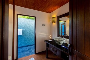 Deluxe Pool Villa | Bathroom | Separate bathtub and shower, rainfall showerhead, free toiletries