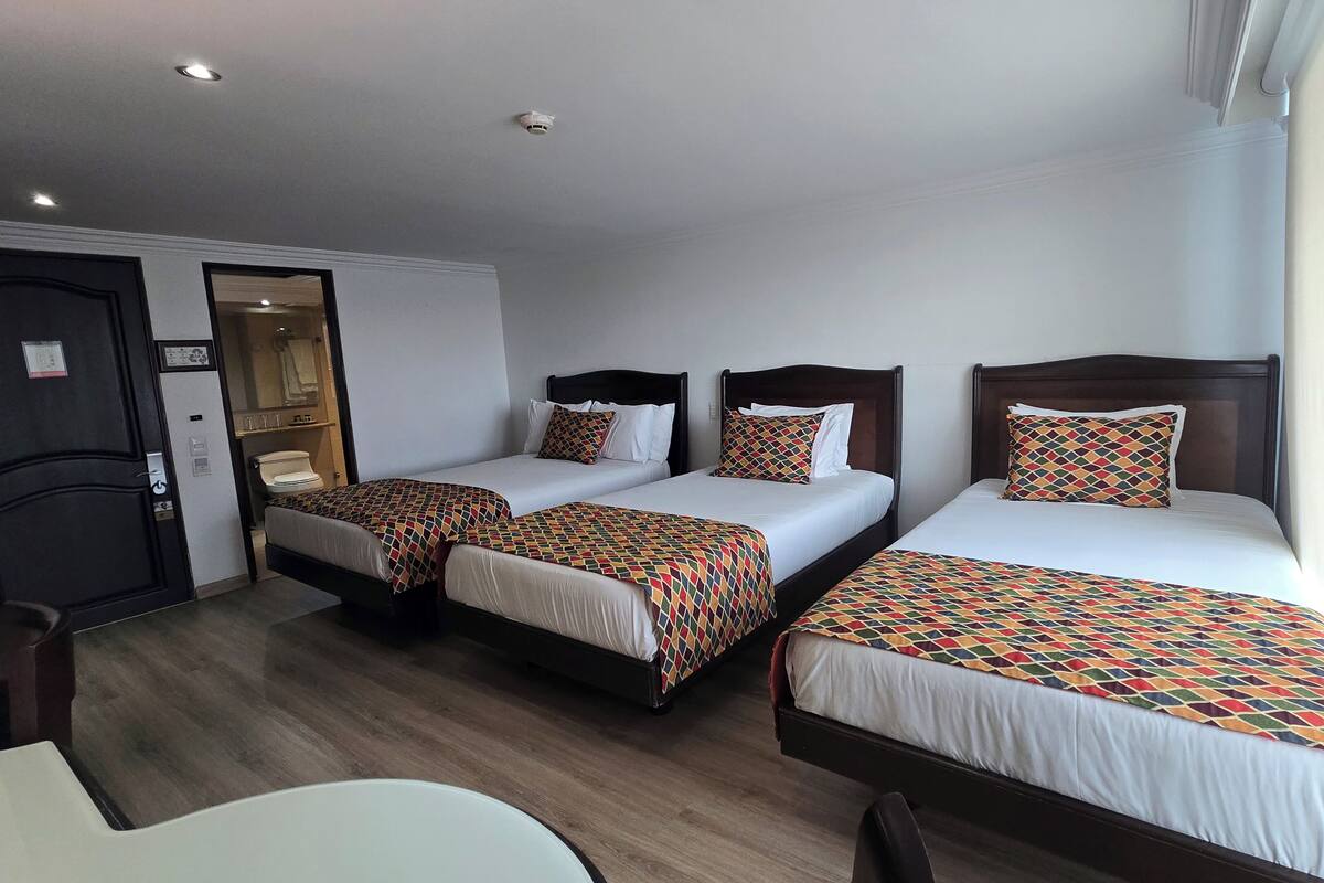 Standard Triple Room | 1 bedroom, premium bedding, minibar, in-room safe