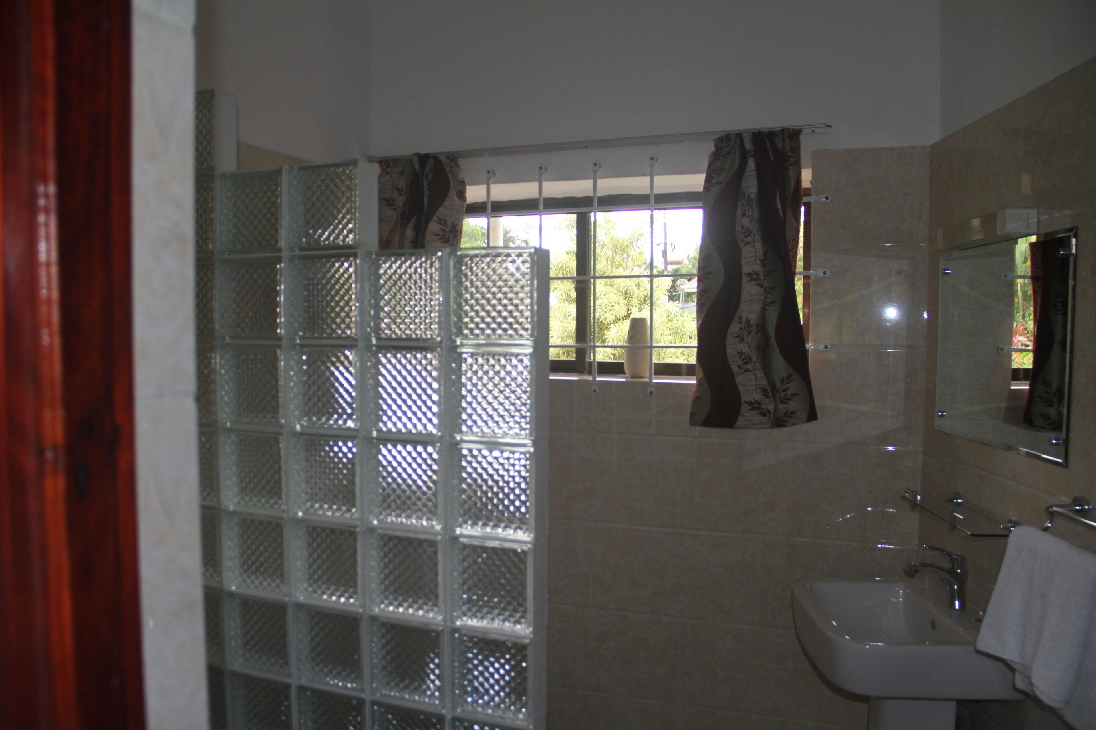 standard double room, garden view | bathroom | shower, free toiletries, hair dryer, towels