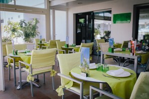 Breakfast, lunch, dinner served; local cuisine 