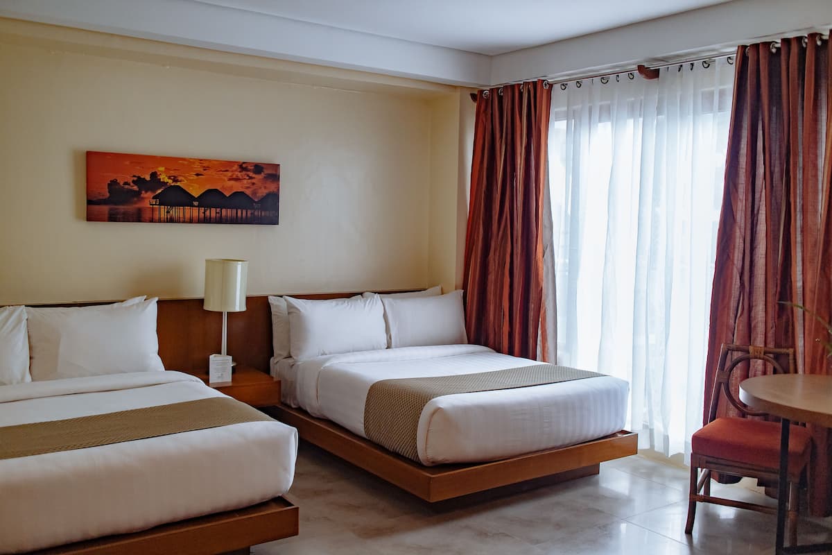 Habitación ejecutiva | Ropa de cama de alta calidad y caja de seguridad en la habitación