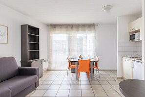 Apartment, 1 Schlafzimmer | Wohnbereich | Flachbildfernseher