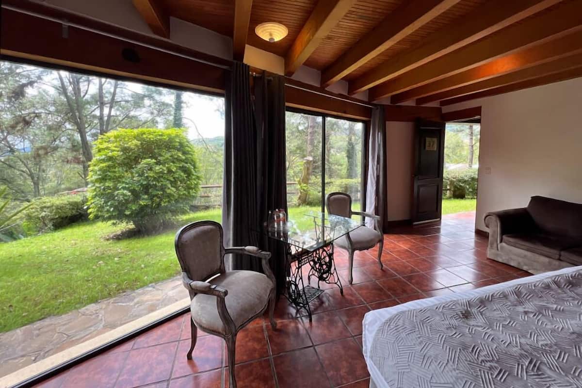 junior suite | 1 bedroom, in-room safe, blackout curtains, iron/ironing board