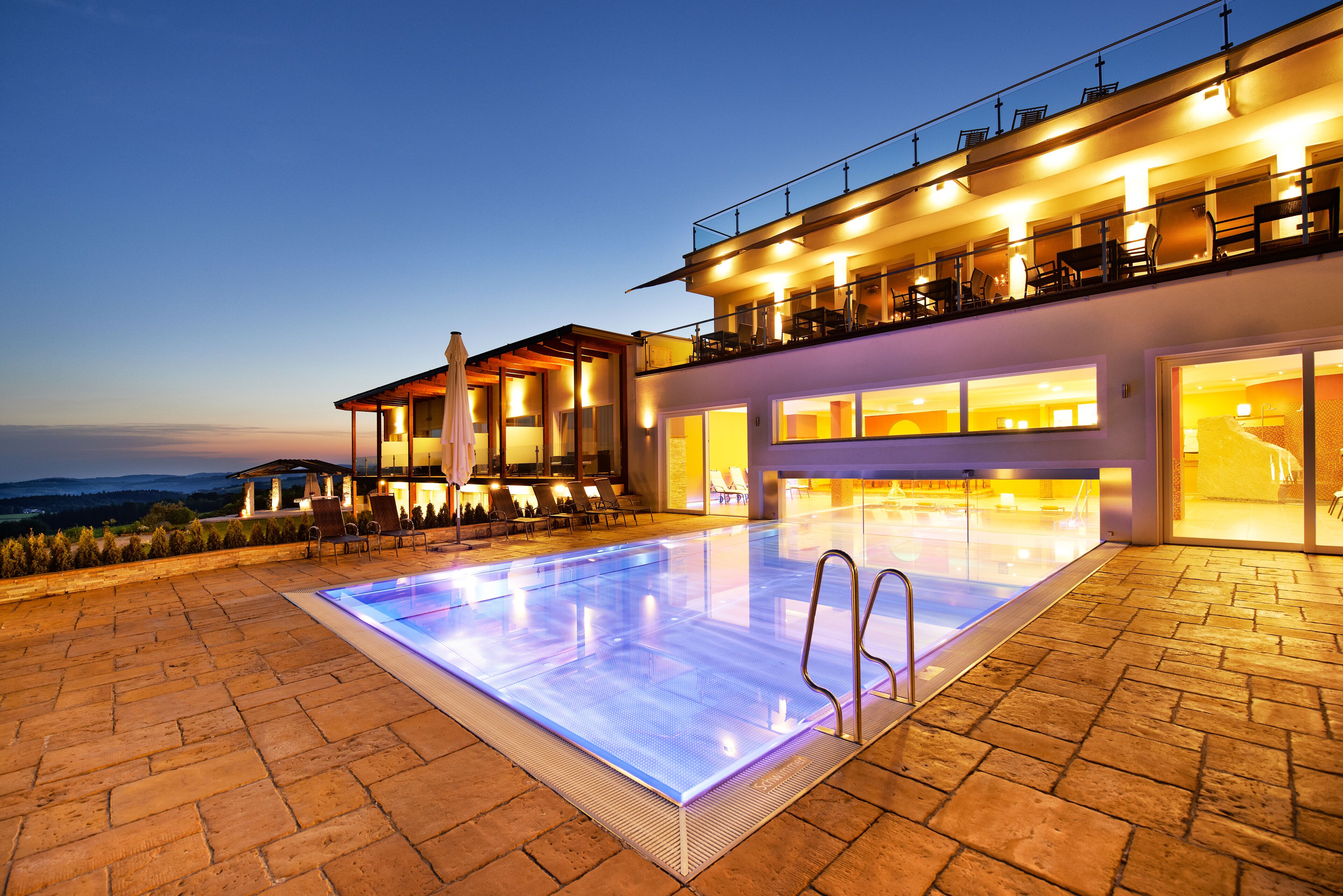 Indoor pool, outdoor pool, open 9:00 AM to 9:00 PM, pool umbrellas