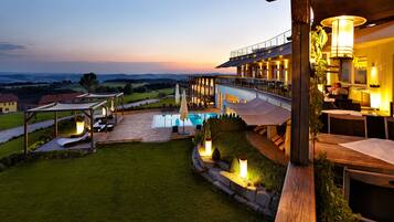 Breakfast, lunch, dinner served; local cuisine, pool views