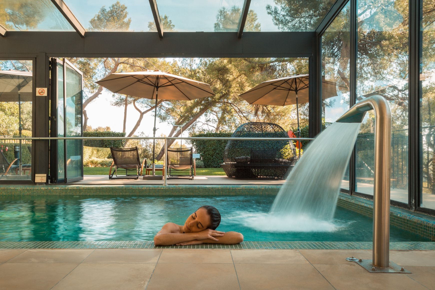 indoor pool, seasonal outdoor pool, pool umbrellas, pool loungers