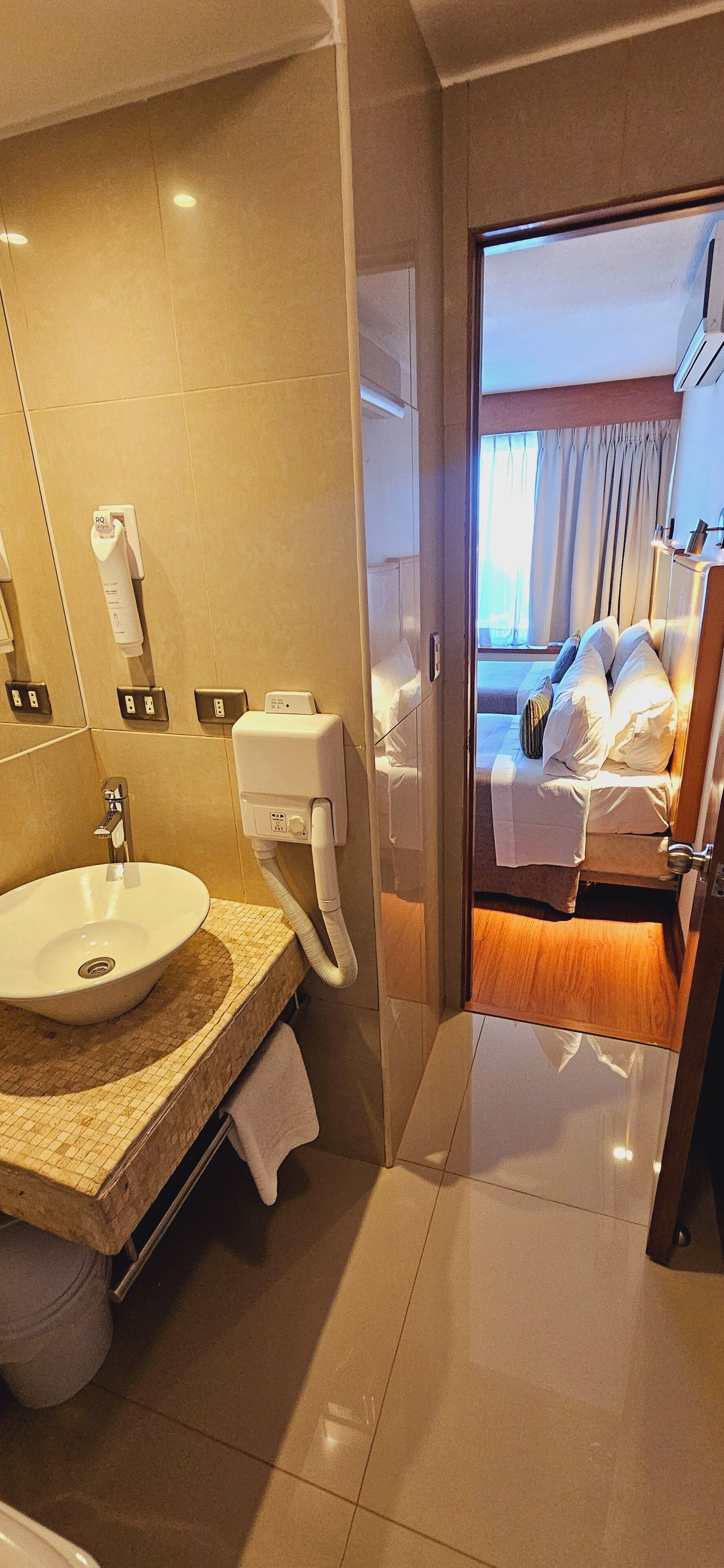 bathtub, free toiletries, hair dryer, towels