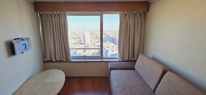 Superior Studio Suite | Living area | 32-inch plasma TV with cable channels, TV - RQ Santiago (Santiago)