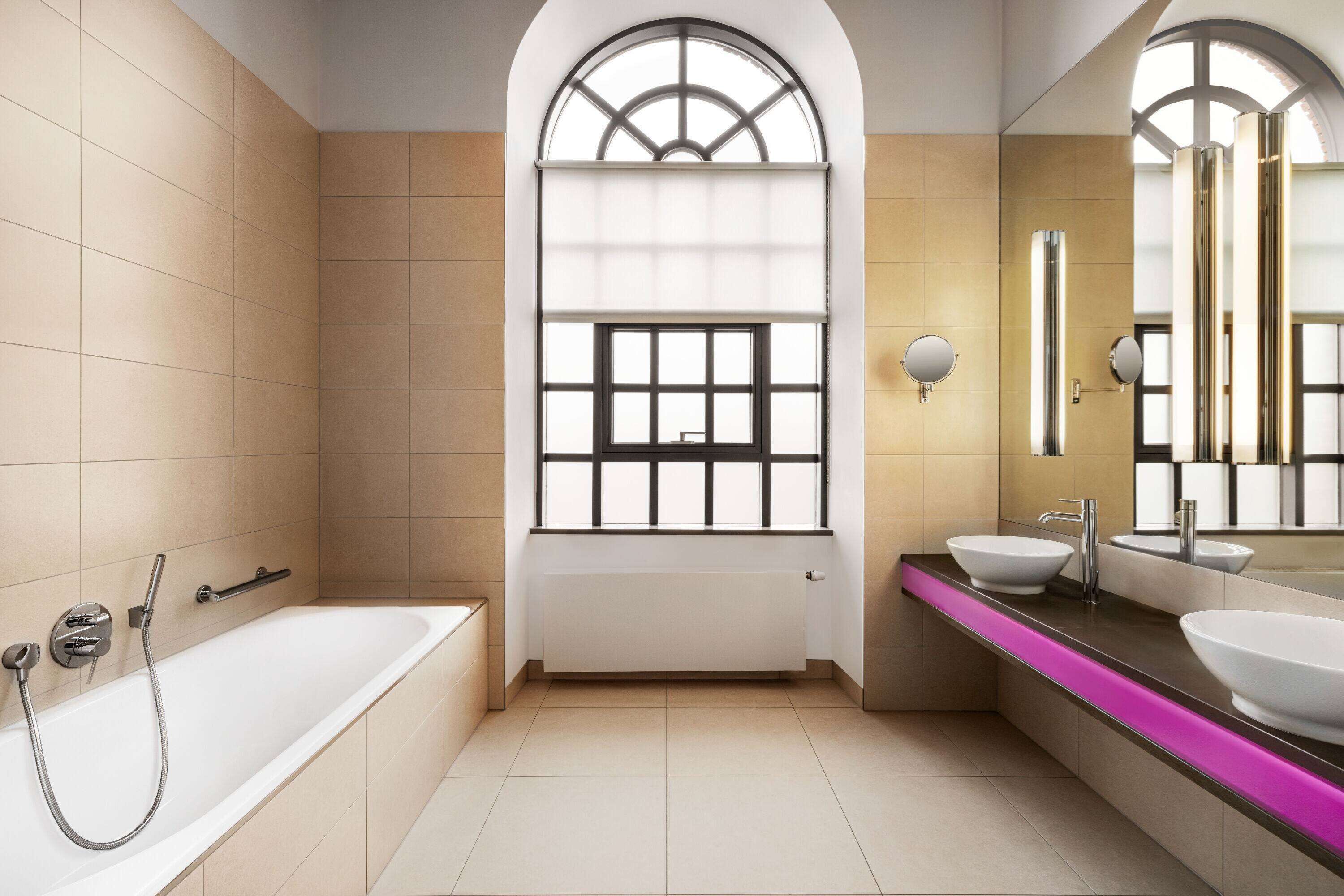 separate bathtub and shower, free toiletries, towels