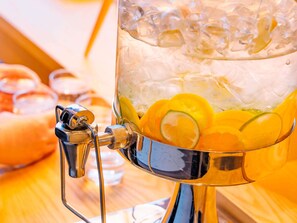 Fresh fruit and ice await in our refreshing beverage station.