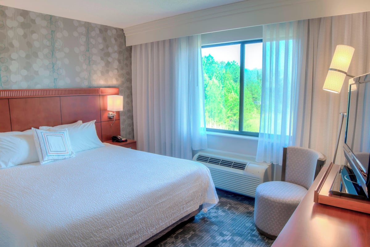 Premium bedding, down duvets, desk, laptop workspace