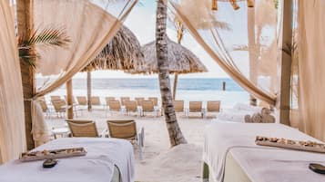 Relax with a soothing massage amidst the tranquil beach views.